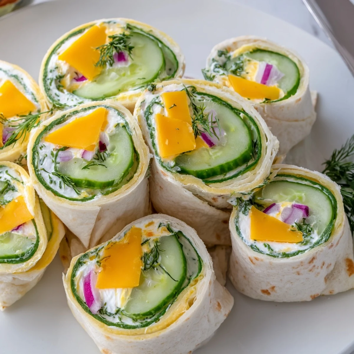 Easy Pickle-in-a-Blanket rolls filled with cheese and dill for tasty snacking.