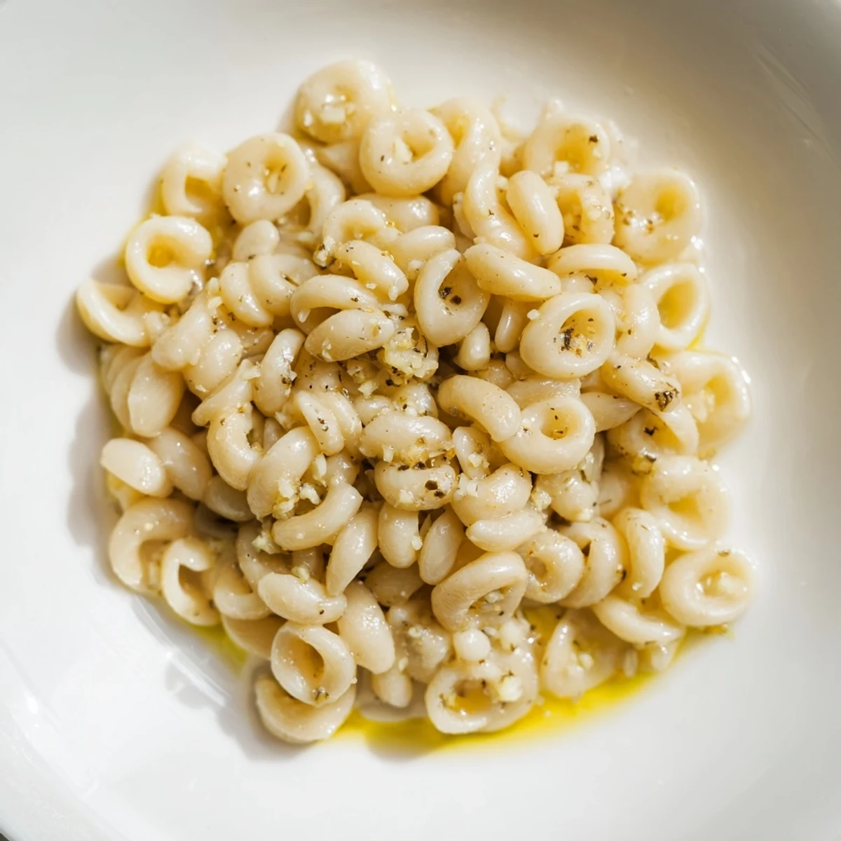 Tender ditalini pasta glistening with melted butter and garlic, a comforting 3-ingredient recipe.