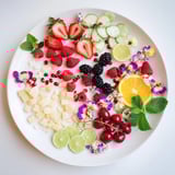 This vibrant photo showcases an array of Champagne Bar Garnishes, ready to elegantly top your bubbly.