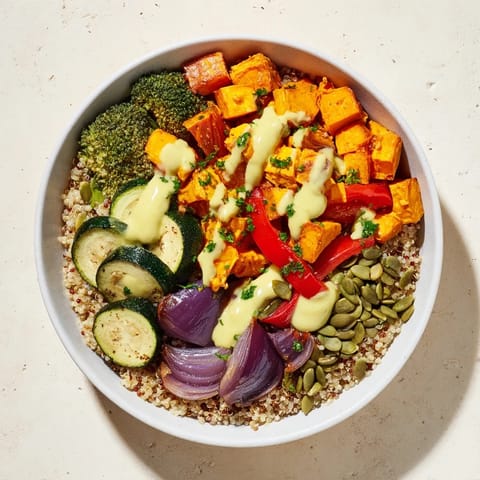 A colorful quinoa bowl brimming with roasted vegetables offers a delicious and healthy meal.